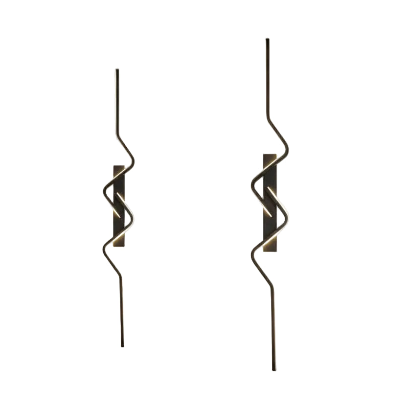 Modern wall lights with abstract design on a marble and striped wall.