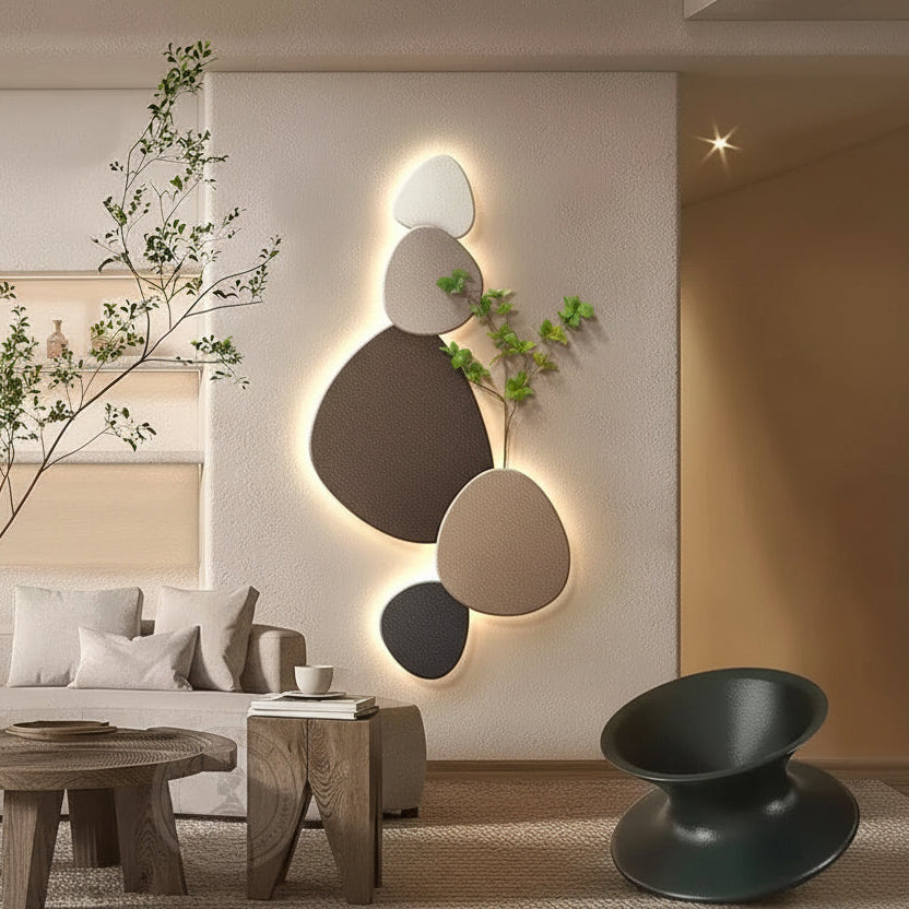 Modern interior design with abstract wall lights and decorative elements.